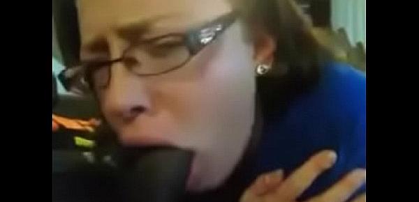  Sexy white chick with glasses sucking black dick